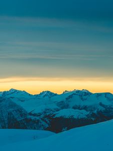 Preview wallpaper mountains, snow, sunset, horizon, sky, snowy