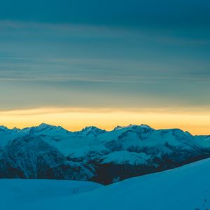 Preview wallpaper mountains, snow, sunset, horizon, sky, snowy