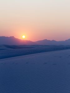 Preview wallpaper mountains, snow, sunset, dusk, winter