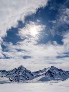 Preview wallpaper mountains, snow, winter, clouds, sky, rays, sun