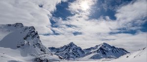 Preview wallpaper mountains, snow, winter, clouds, sky, rays, sun