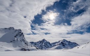 Preview wallpaper mountains, snow, winter, clouds, sky, rays, sun