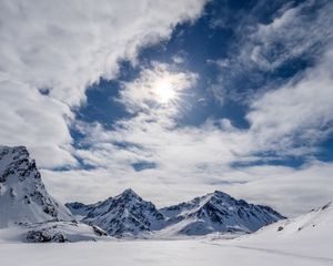 Preview wallpaper mountains, snow, winter, clouds, sky, rays, sun