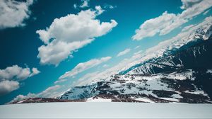 Preview wallpaper mountains, snow-capped, sky, snow