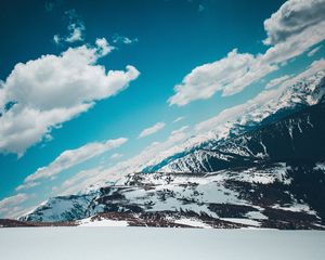 Preview wallpaper mountains, snow-capped, sky, snow