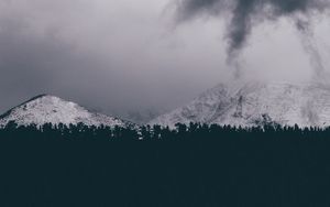 Preview wallpaper mountains, snowy, clouds, overcast, snow, winter