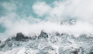 Preview wallpaper mountains, snowy, clouds, snow, landscape