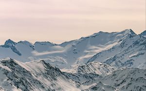 Preview wallpaper mountains, snowy, peaks, forest