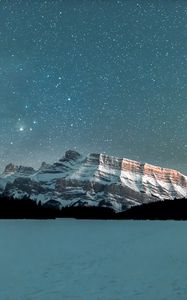 Preview wallpaper mountains, snowy, starry sky