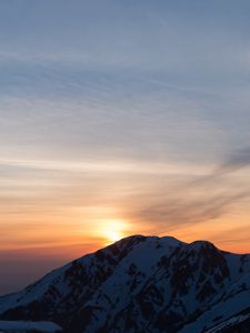 Preview wallpaper mountains, snowy, sunset, sky