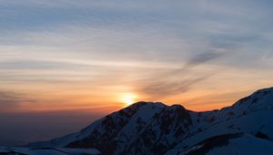 Preview wallpaper mountains, snowy, sunset, sky