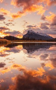 Preview wallpaper mountains, spruce, trees, sunset, reflection, clouds