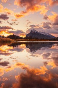 Preview wallpaper mountains, spruce, trees, sunset, reflection, clouds