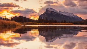 Preview wallpaper mountains, spruce, trees, sunset, reflection, clouds