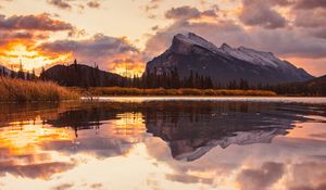 Preview wallpaper mountains, spruce, trees, sunset, reflection, clouds