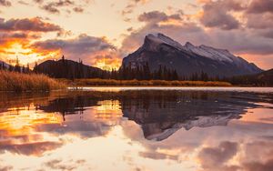 Preview wallpaper mountains, spruce, trees, sunset, reflection, clouds