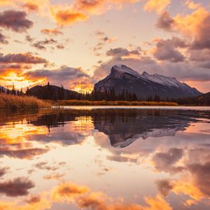 Preview wallpaper mountains, spruce, trees, sunset, reflection, clouds