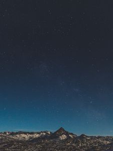 Preview wallpaper mountains, starry sky, night, stars, peak, snowy