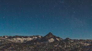 Preview wallpaper mountains, starry sky, night, stars, peak, snowy