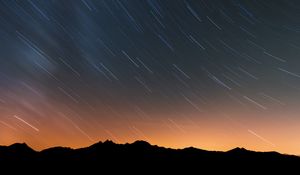 Preview wallpaper mountains, starry sky, night, outlines, dark, long exposure