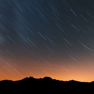 Preview wallpaper mountains, starry sky, night, outlines, dark, long exposure