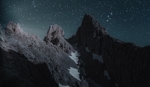 Preview wallpaper mountains, starry sky, peak, snow-covered, night