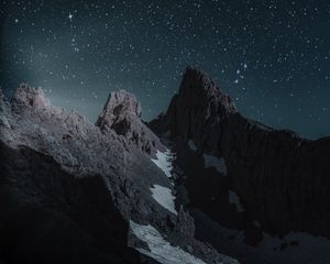 Preview wallpaper mountains, starry sky, peak, snow-covered, night