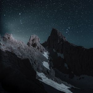 Preview wallpaper mountains, starry sky, peak, snow-covered, night