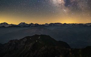 Preview wallpaper mountains, starry sky, rocks, space
