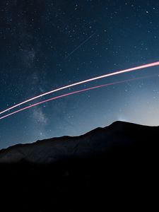 Preview wallpaper mountains, starry sky, stars, line, glow, night