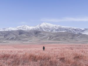 Preview wallpaper mountains, steppe, man, loneliness, landscape