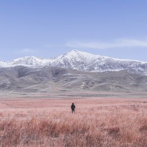 Preview wallpaper mountains, steppe, man, loneliness, landscape