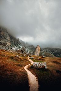 Preview wallpaper mountains, stones, clouds, trail, road, nature