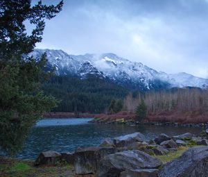 Preview wallpaper mountains, stones, lake, trees, clouds, nature