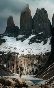 Preview wallpaper mountains, stones, lake, man, alone, winter