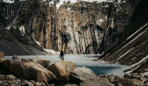 Preview wallpaper mountains, stones, lake, man, alone, winter