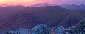 Preview wallpaper mountains, stones, sunset, sky, scotland