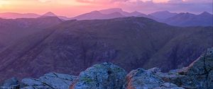 Preview wallpaper mountains, stones, sunset, sky, scotland
