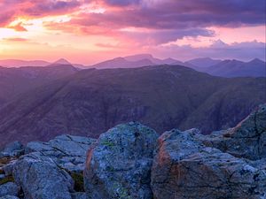 Preview wallpaper mountains, stones, sunset, sky, scotland