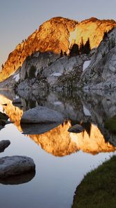 Preview wallpaper mountains, stones, water, shades, rocks, coast