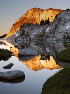 Preview wallpaper mountains, stones, water, shades, rocks, coast