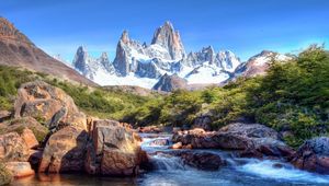 Preview wallpaper mountains, stones, wood, tops, snow-covered, brightly, stream, river, current, murmur, shadows