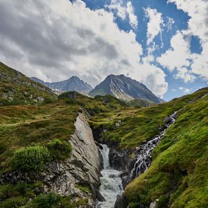 Preview wallpaper mountains, stream, stones, grass, relief