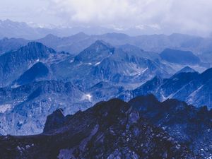 Preview wallpaper mountains, summit, rocks, fog, clouds