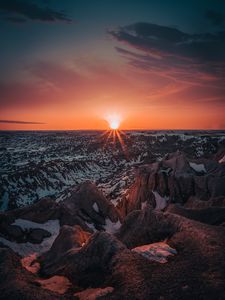 Preview wallpaper mountains, sun, sunset, sunlight, horizon, snowy