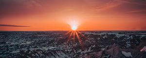 Preview wallpaper mountains, sun, sunset, sunlight, horizon, snowy