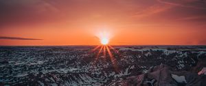 Preview wallpaper mountains, sun, sunset, sunlight, horizon, snowy