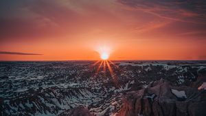 Preview wallpaper mountains, sun, sunset, sunlight, horizon, snowy