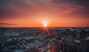 Preview wallpaper mountains, sun, sunset, sunlight, horizon, snowy