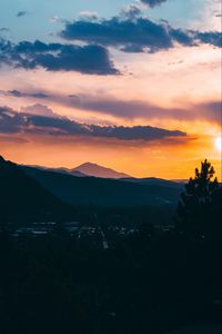 Preview wallpaper mountains, sunset, aerial view, village, clouds